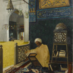 Man reading the Quran-1910